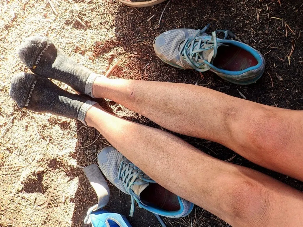 Hiker's dusty legs and Drymax socks on the John Muir Trail