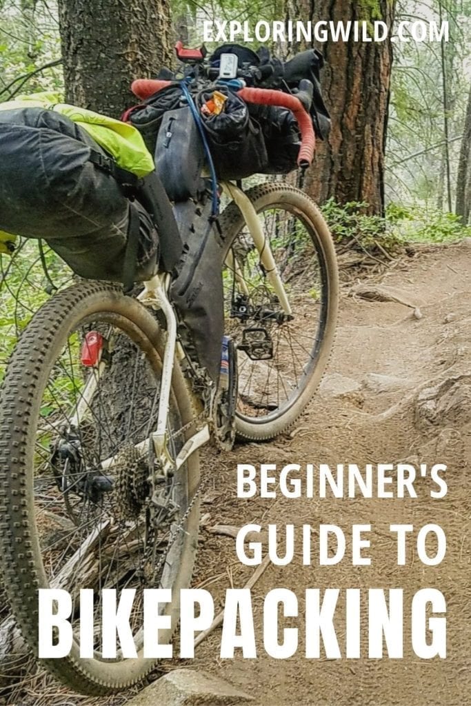 Picture of bike on forest trail with text: Beginner's Guide to Bikepacking