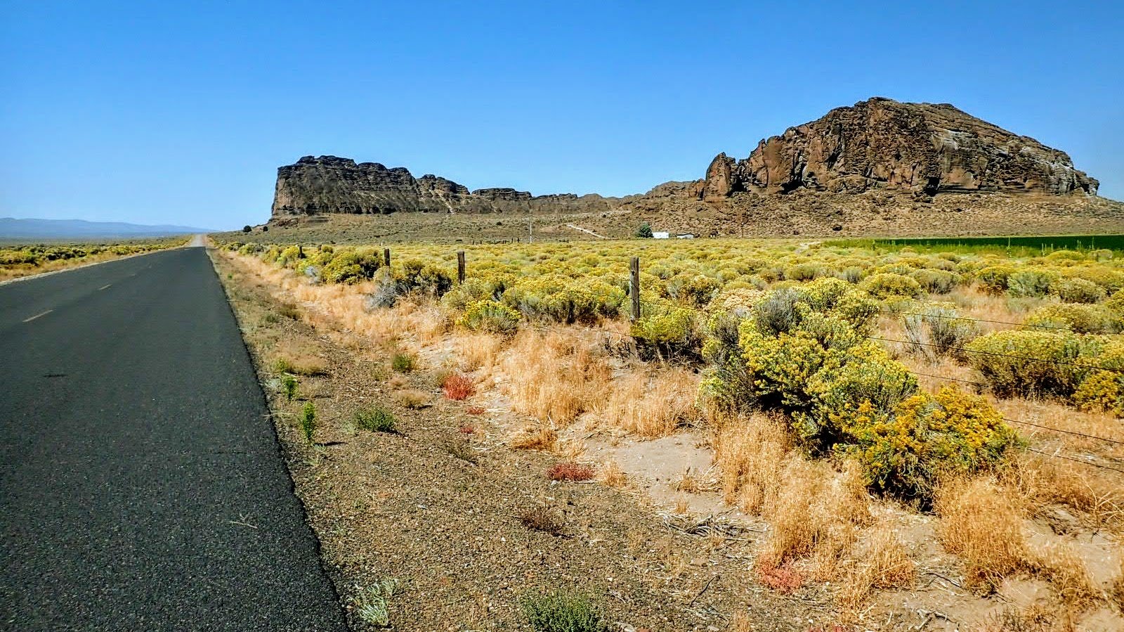 Rock formation rising above desert basin