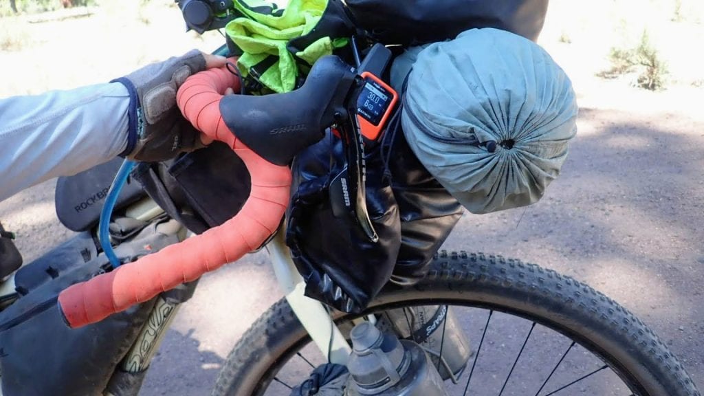 Handlebars of loaded bikepacking bike
